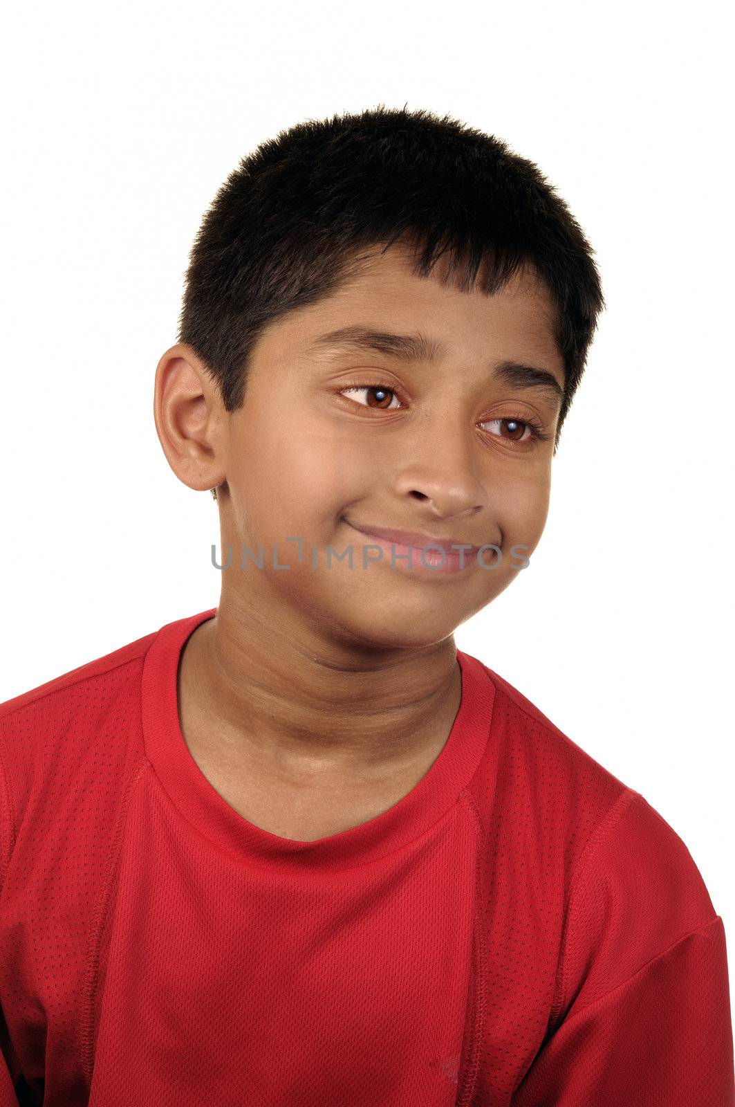 Photo of adorable young boy looking at camera