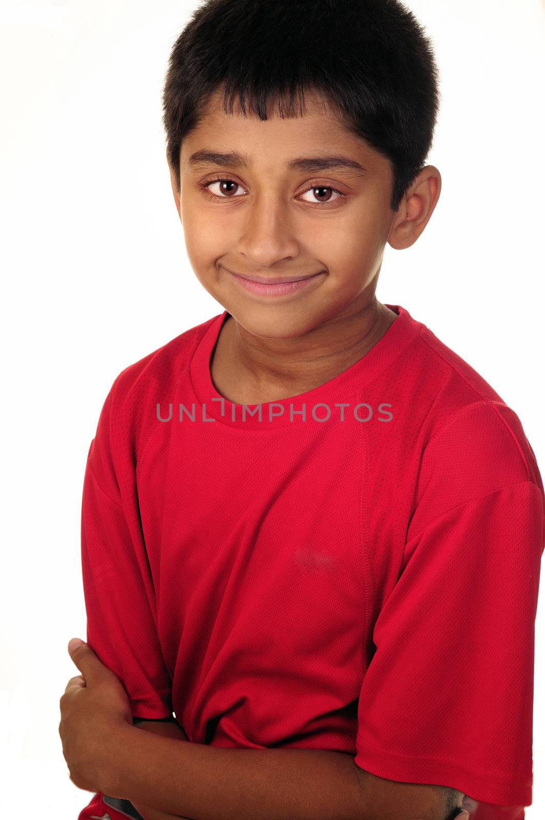 Photo of adorable young boy looking at camera