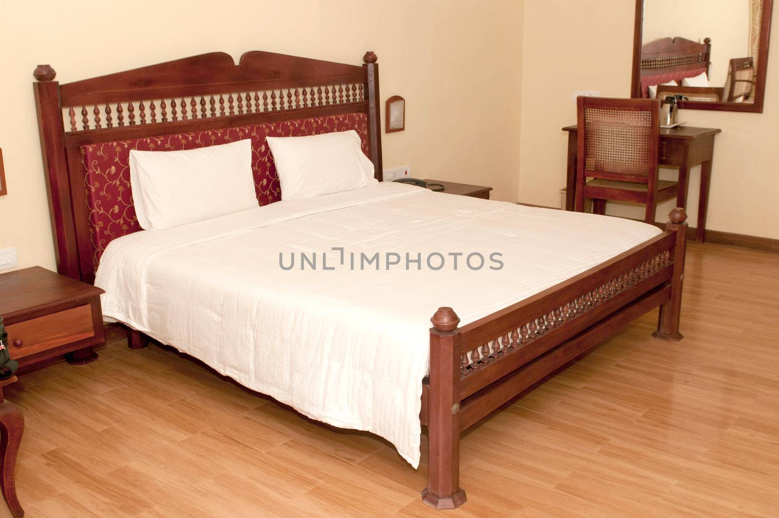 Cozy bed at a luxurious hotel room