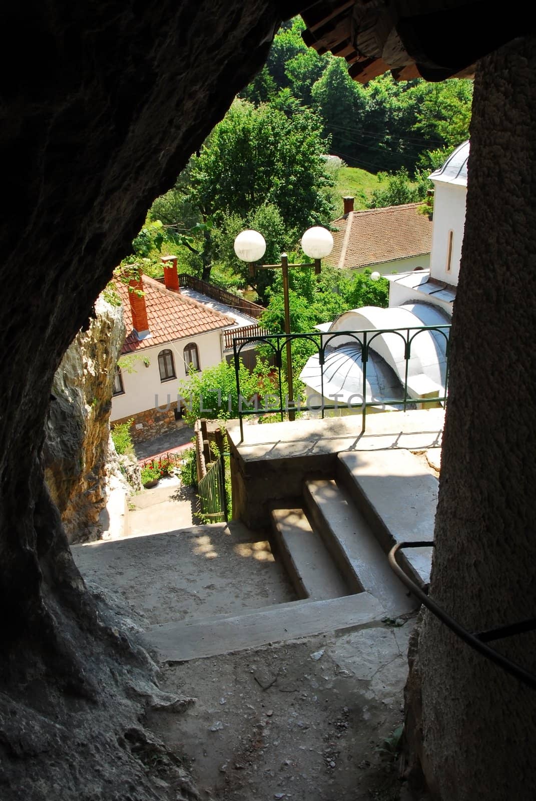 stone stairs into cave in old orthodox Gornjak Monastery in Serbia