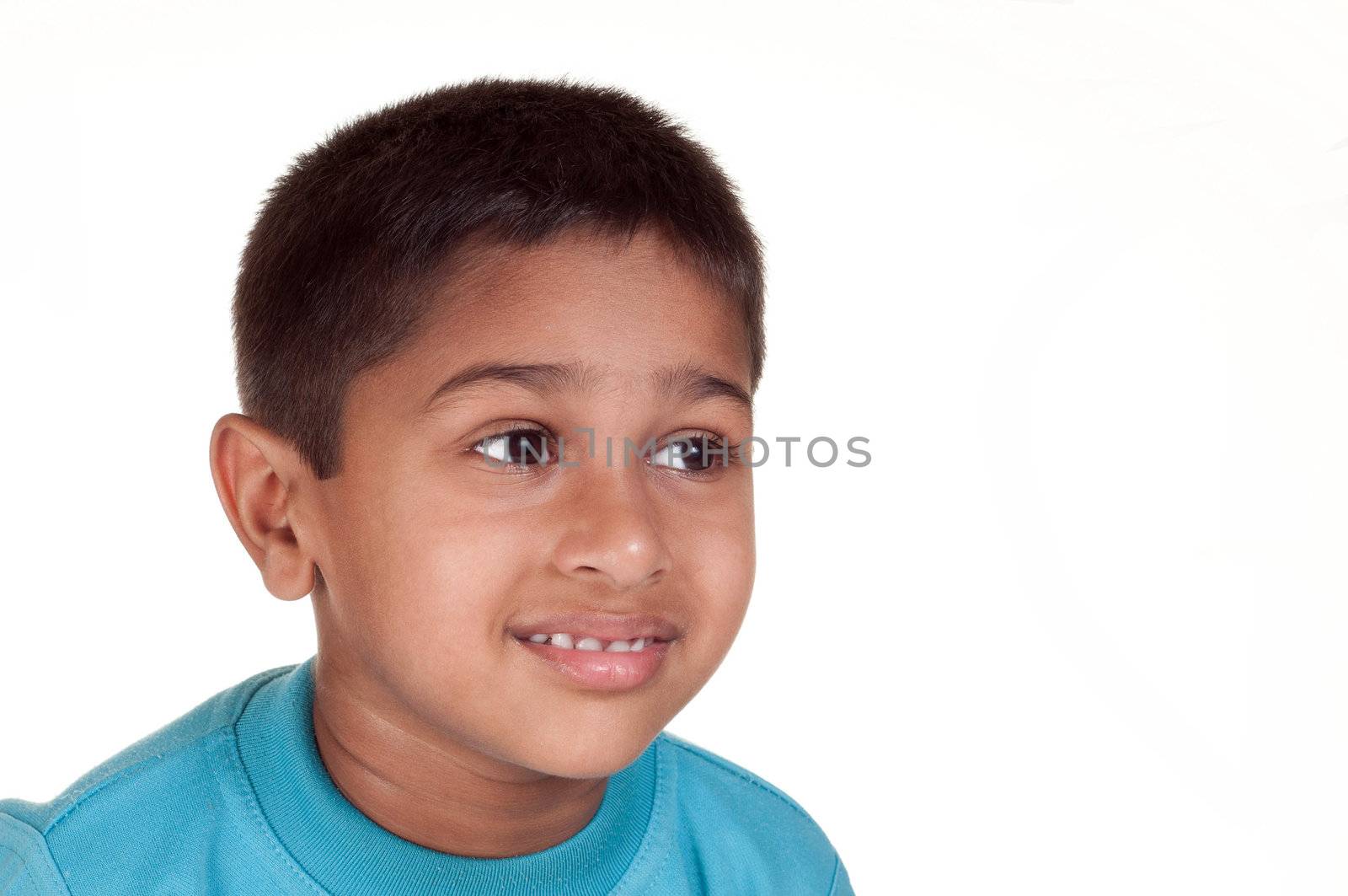Photo of adorable young boy looking at camera