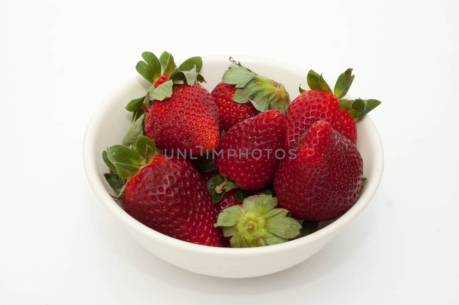 Strawberries isolated over white background