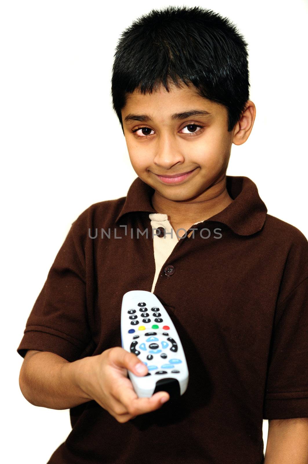 An handsome Indian kid holding a remote control