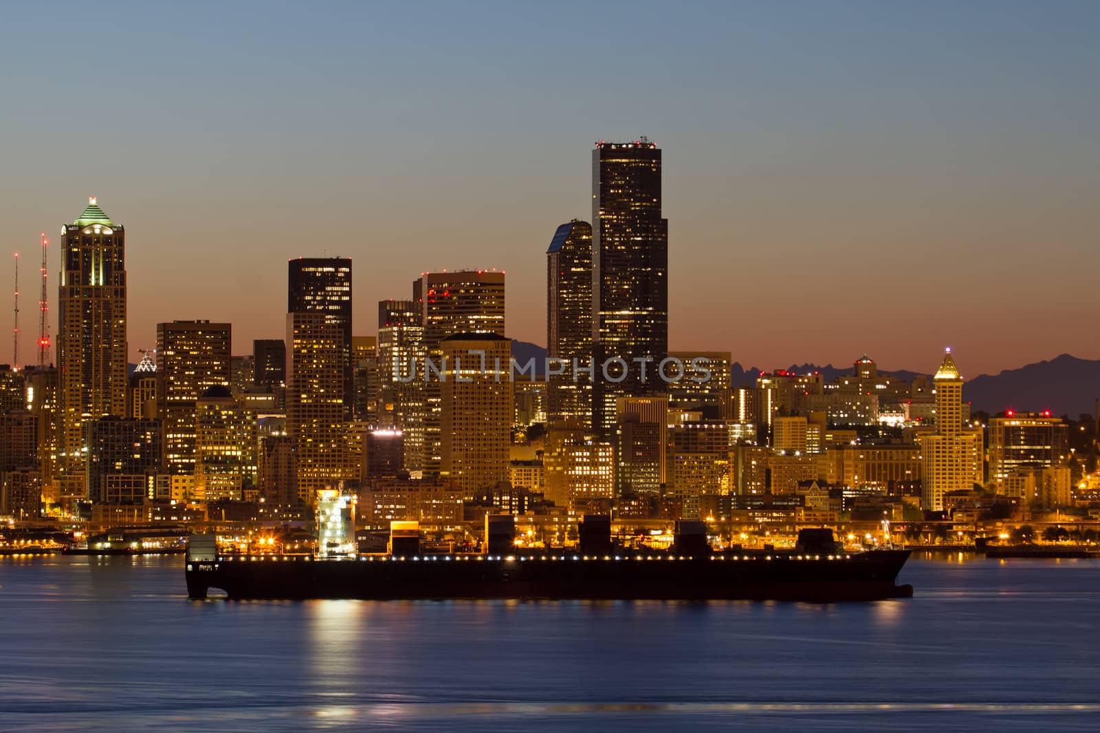 Container Ship on Puget Sound along Seattle Washington Skyline at Dawn