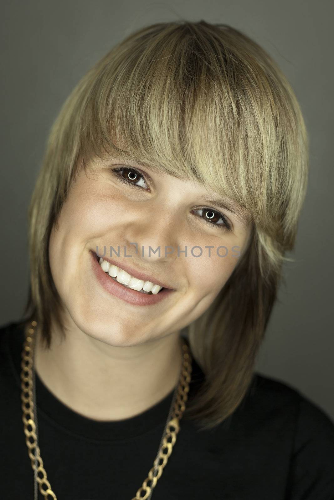 An image of a beautiful smiling teen girl