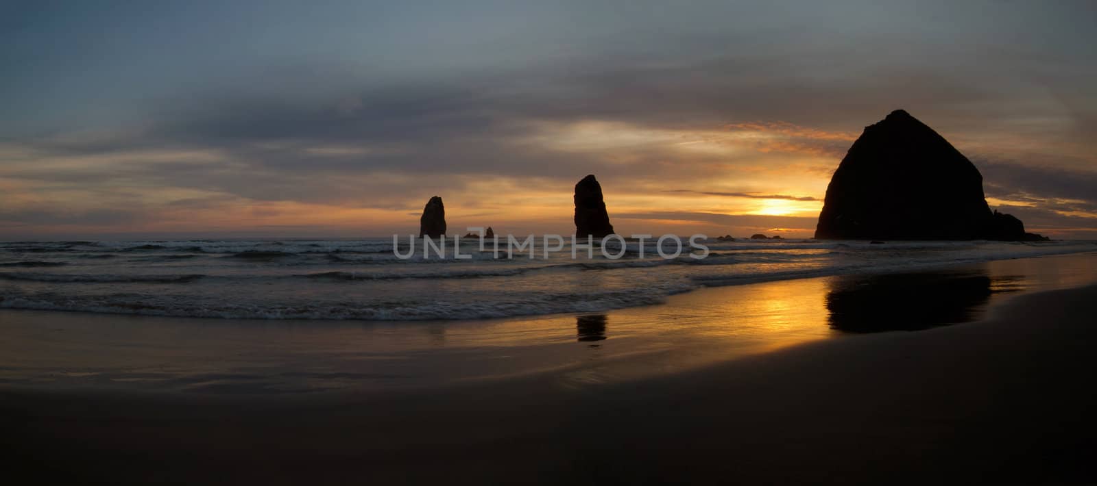 Sunset OVer Haystack Rock on Cannon Beach at Oregon Coast