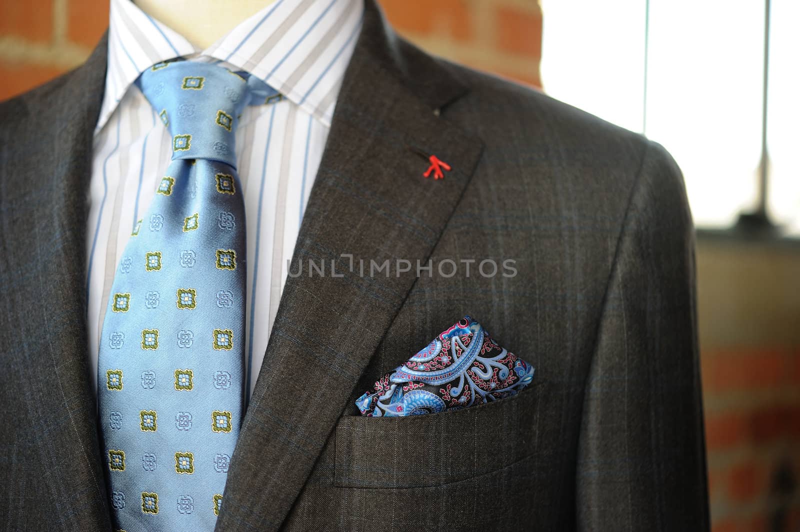 Image of a Gray Suit with Blue Pinstriping and boutonniere