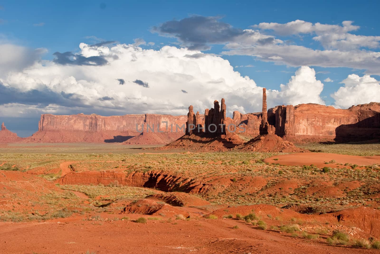 Storm clouds gather over Monument Valley by emattil
