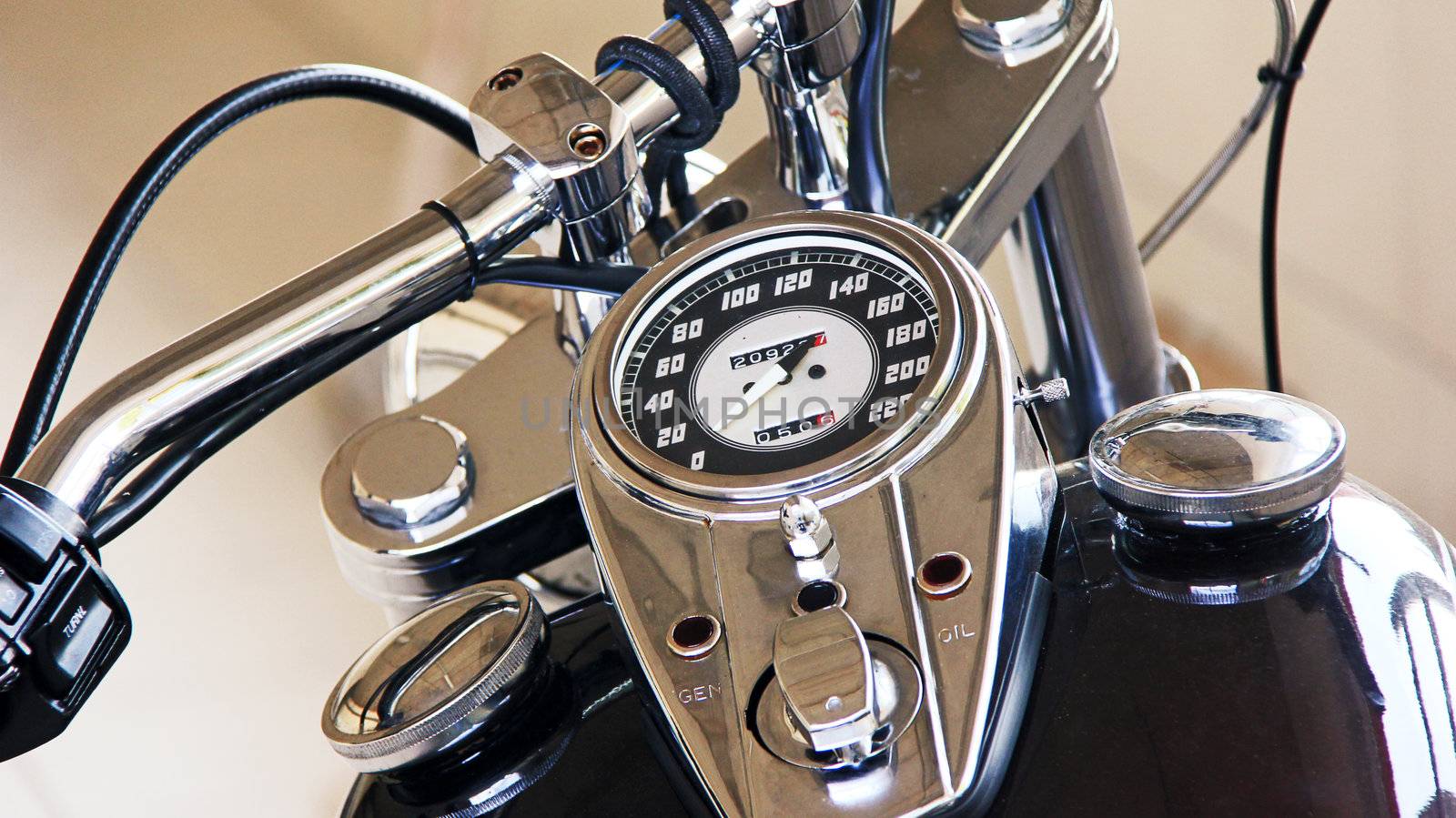 detail picture of tank and tachometer on a chromed chopper
