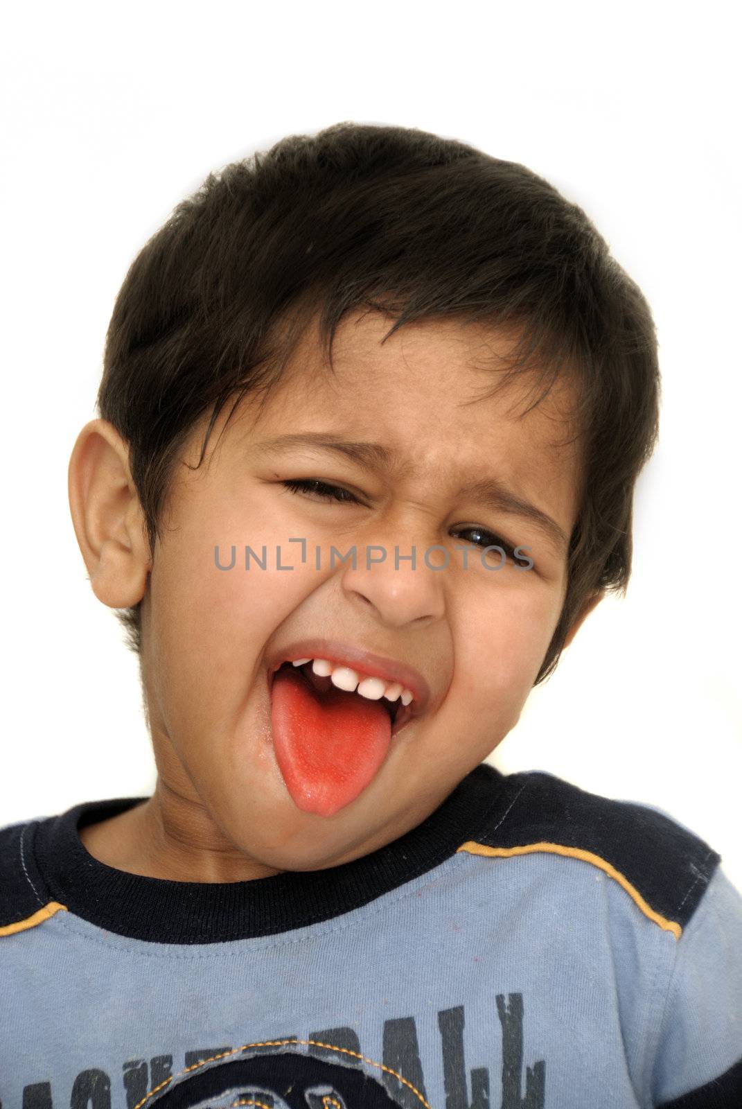 An handsome Indian kid looking very animated