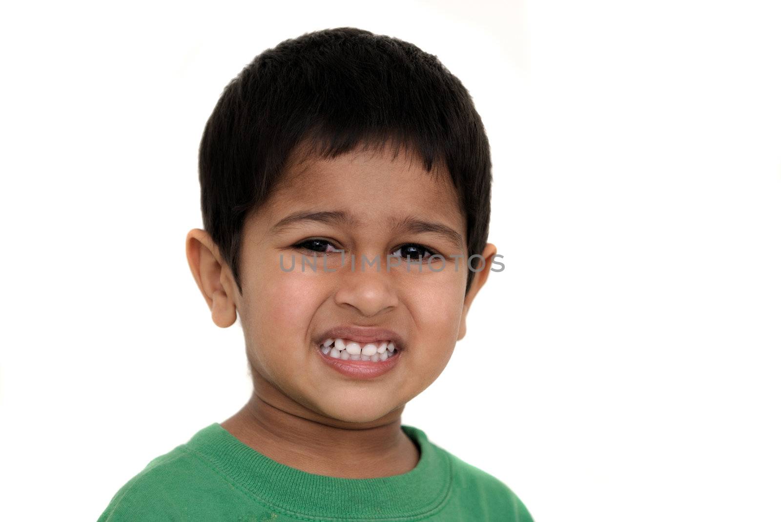 An handsome Indian kid irritated at something