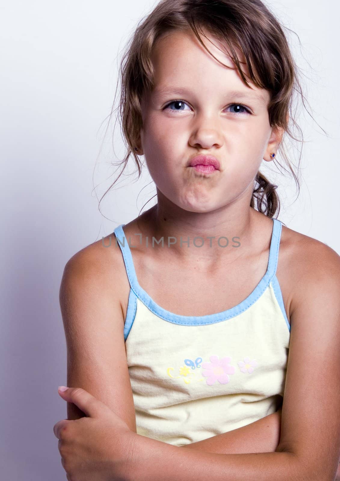 Cute girl with glass of milk