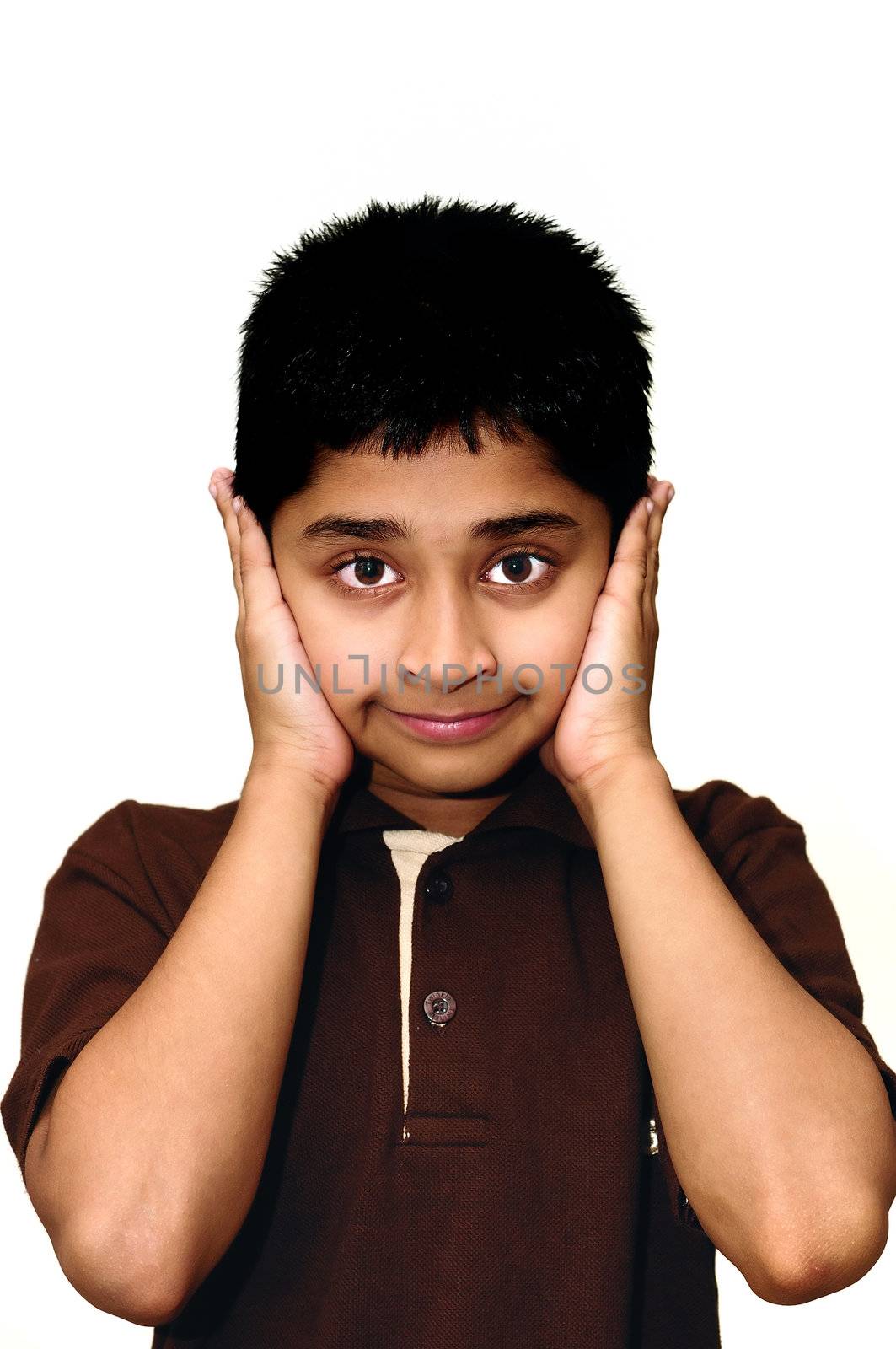 An handsome Indian kid looking very stubborn