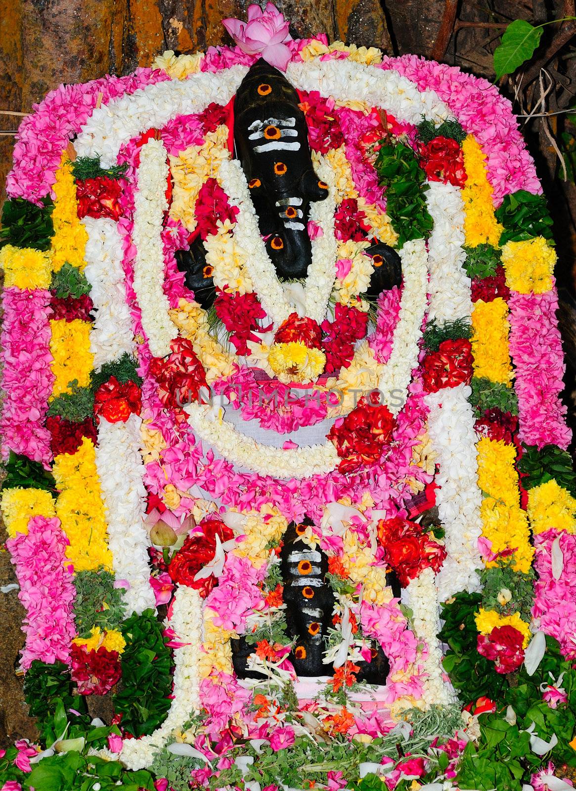 Beautifully ornated and decorated Lord Ganesha with lowers