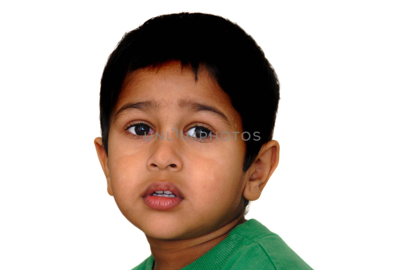 An handsome Indian kid looking very sad