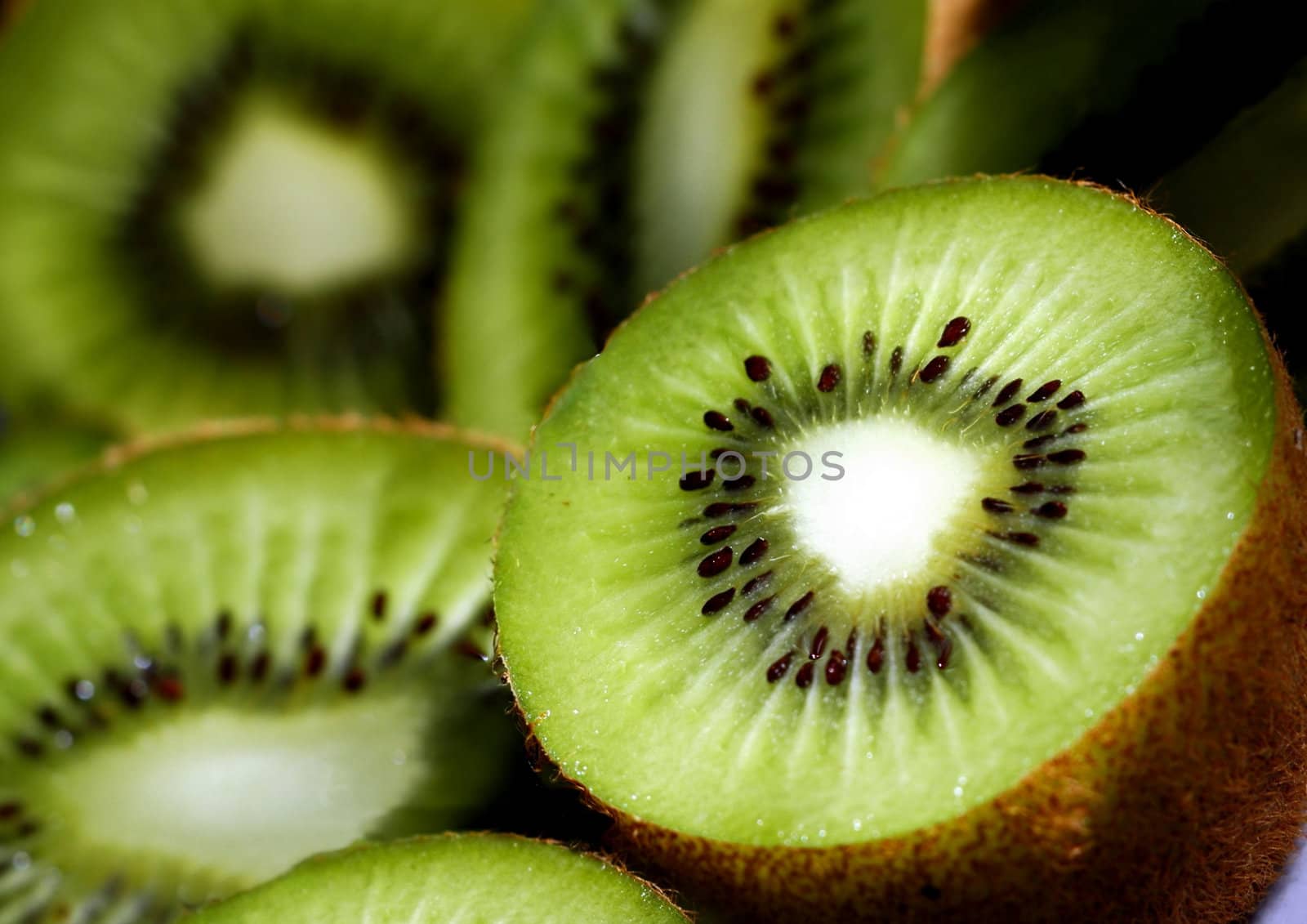 Food Kiwi Fruit slices background.Close-up.