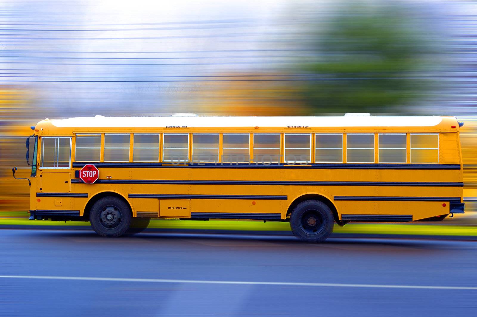 A school bus speeding on a local rad