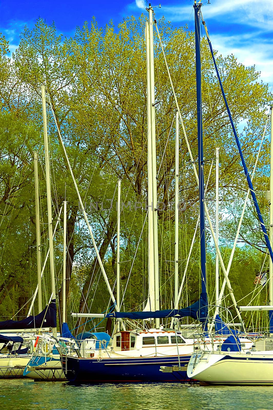  fishing boats ready for sail on a bright sunny day