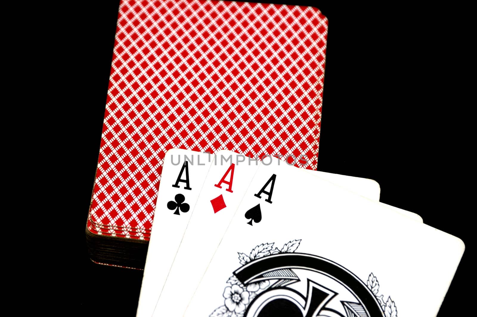 Three Aces signifying winning cards at poker