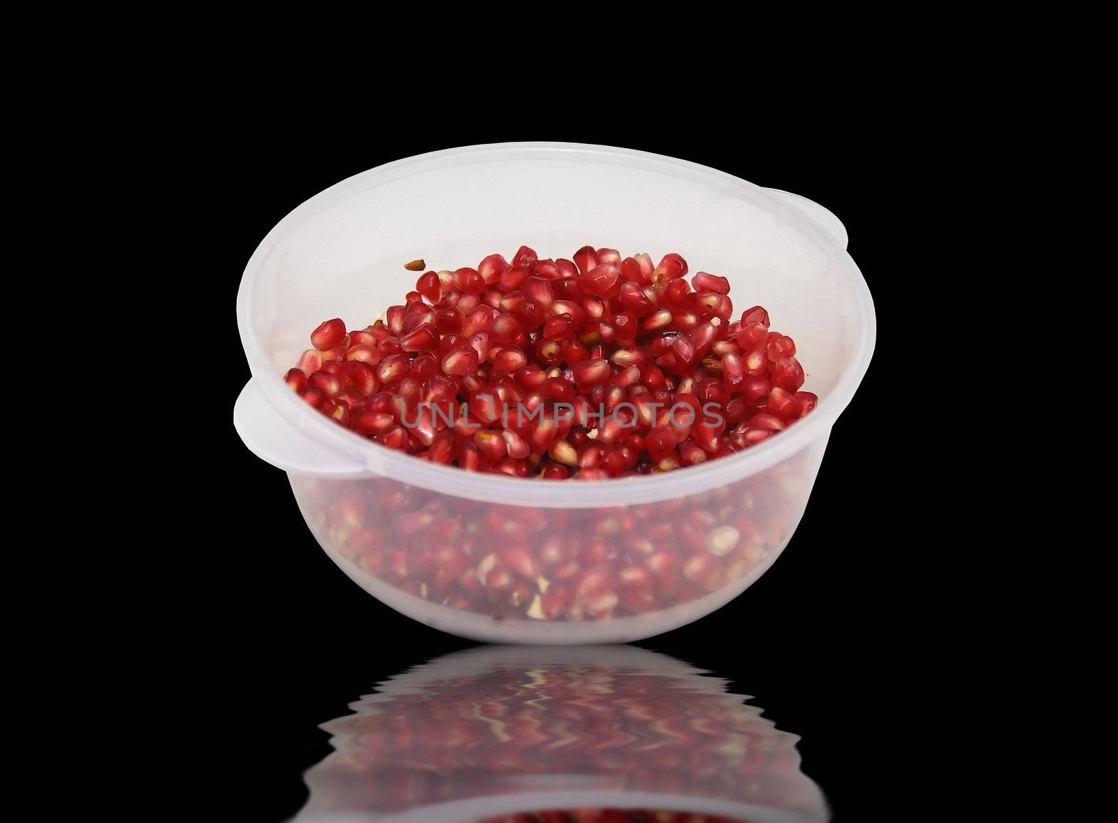 Freshly cut pomegranate ready to be served. An health food