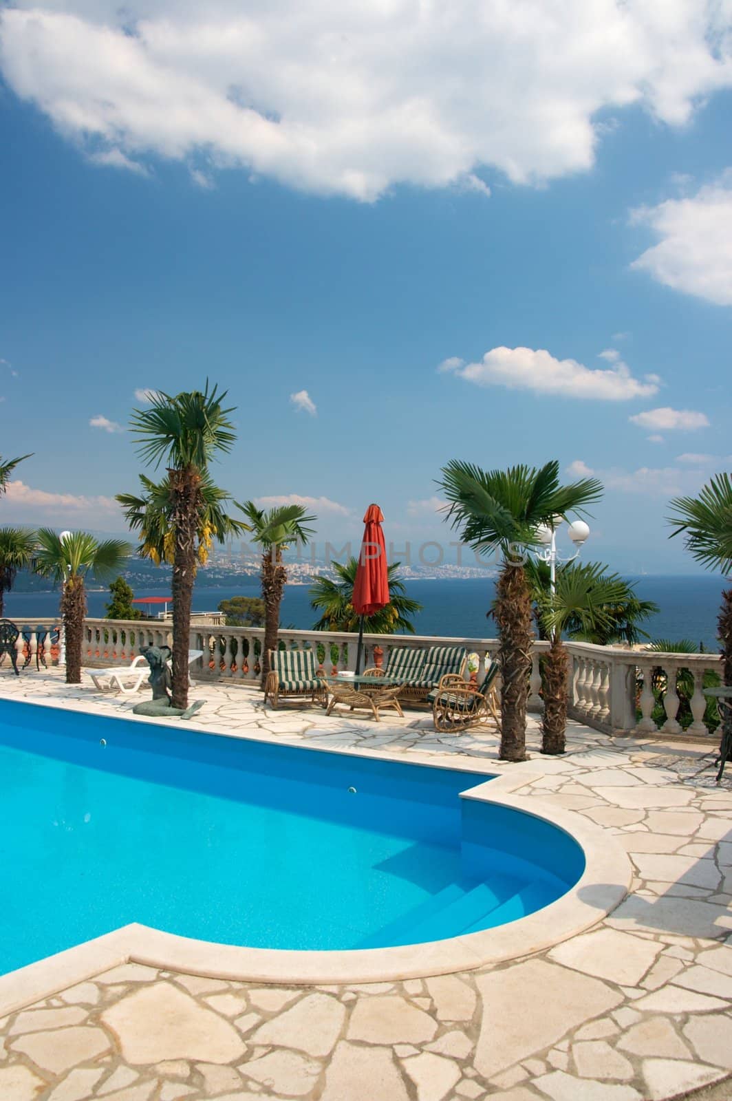 Outdoor swimming pool in a tropical area