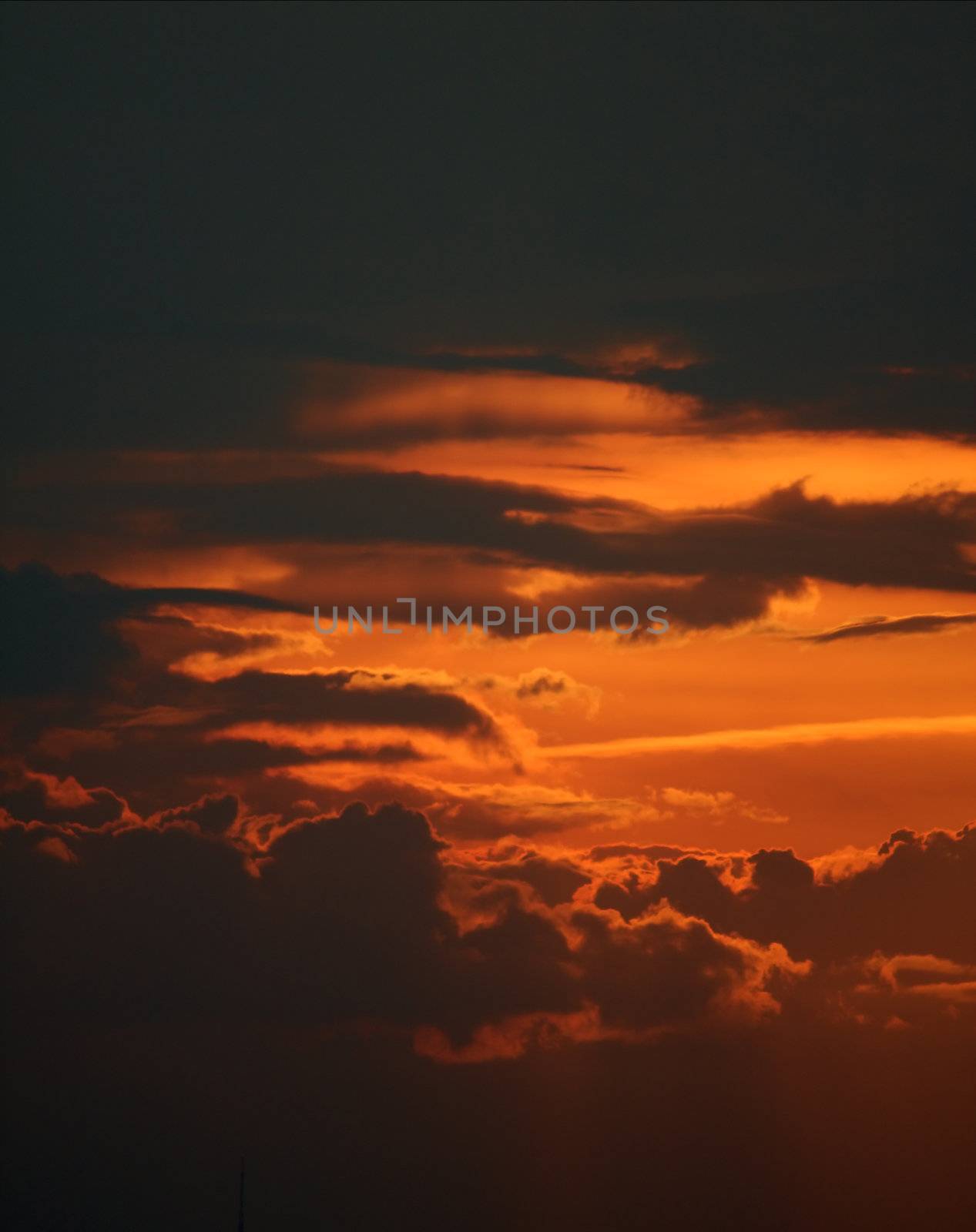 Dramatic twilight sky with dark clouds