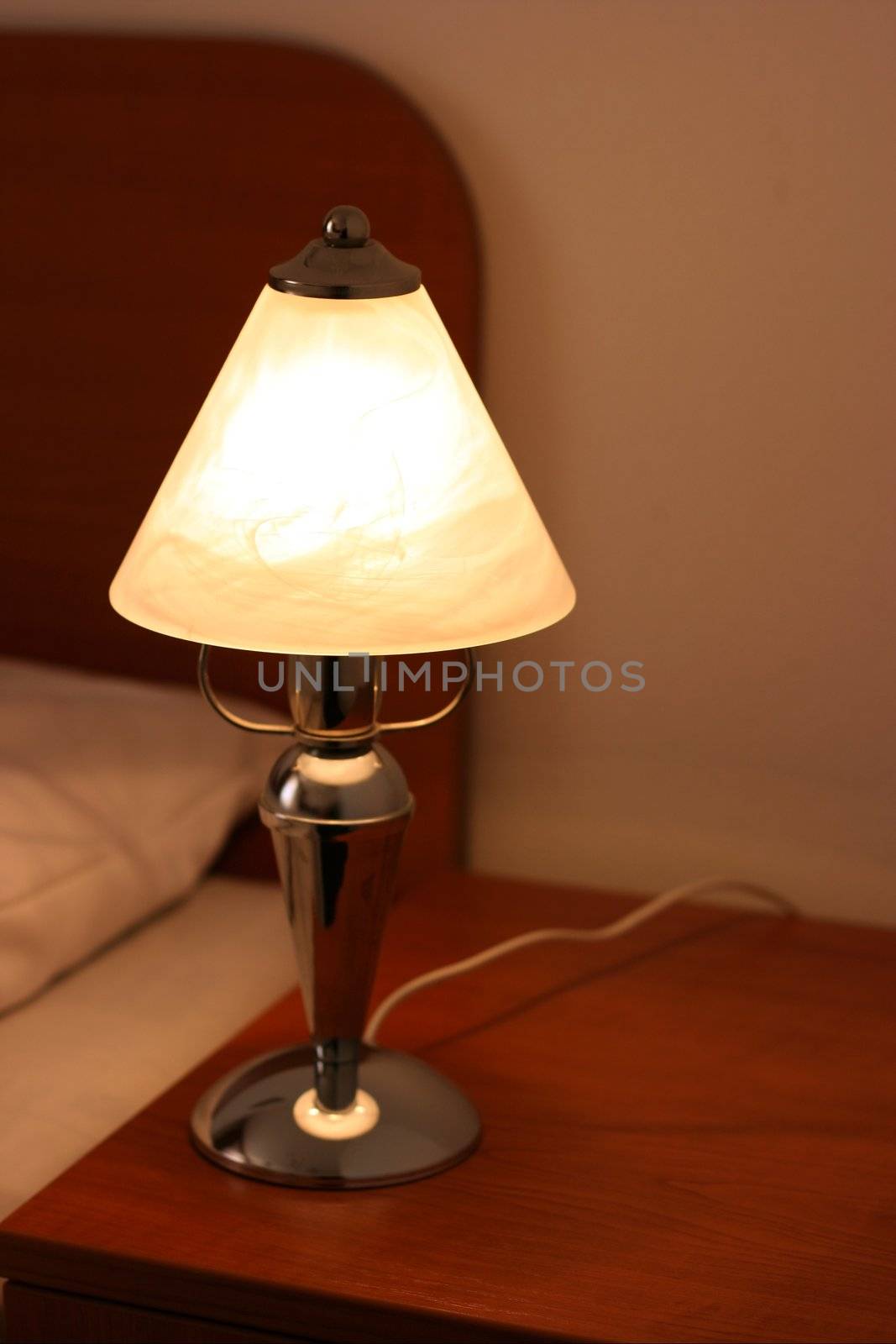 Lamp in the evening in a hotel room