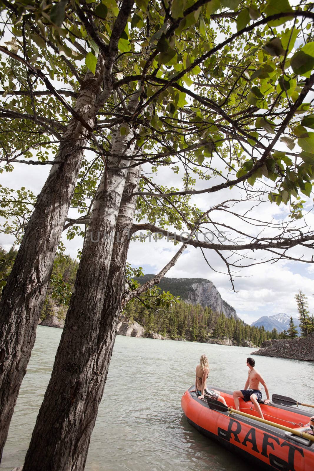 Couple enjoying their vacation by leaf