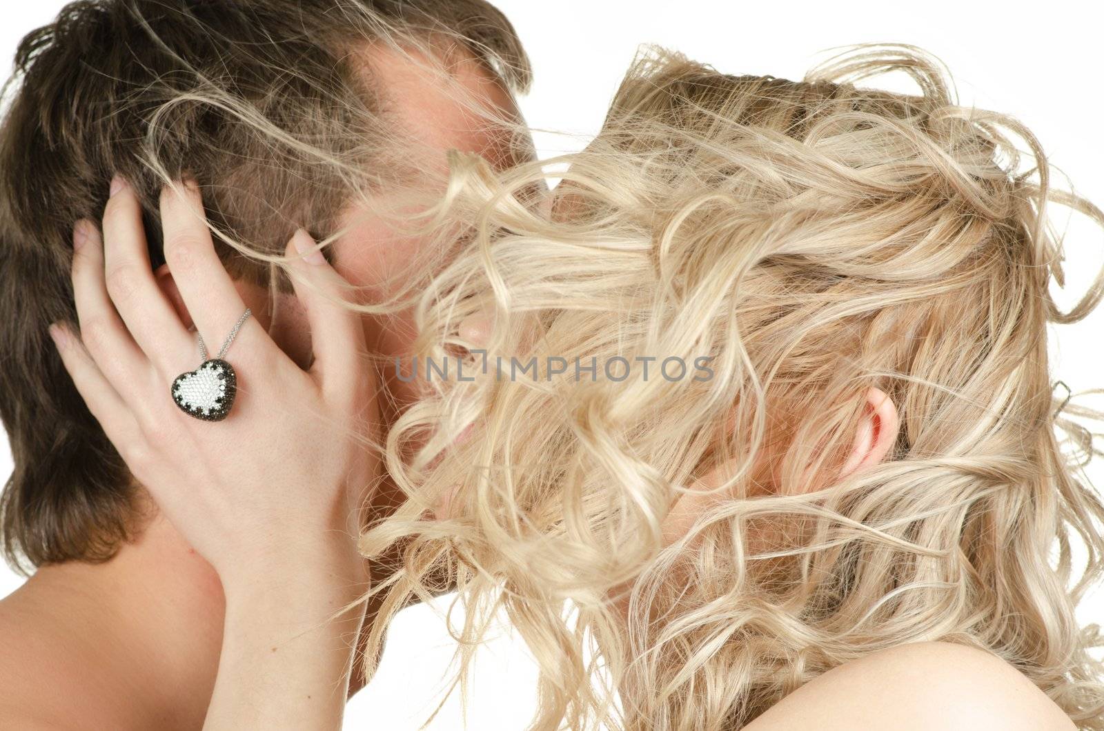 Kissing man and woman - lovers closeup portraits