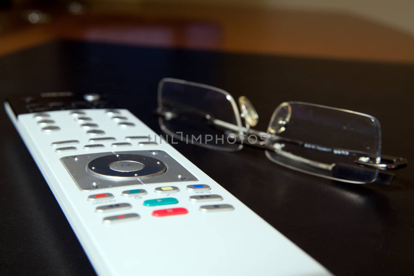 TV remote and glasses by remik44992