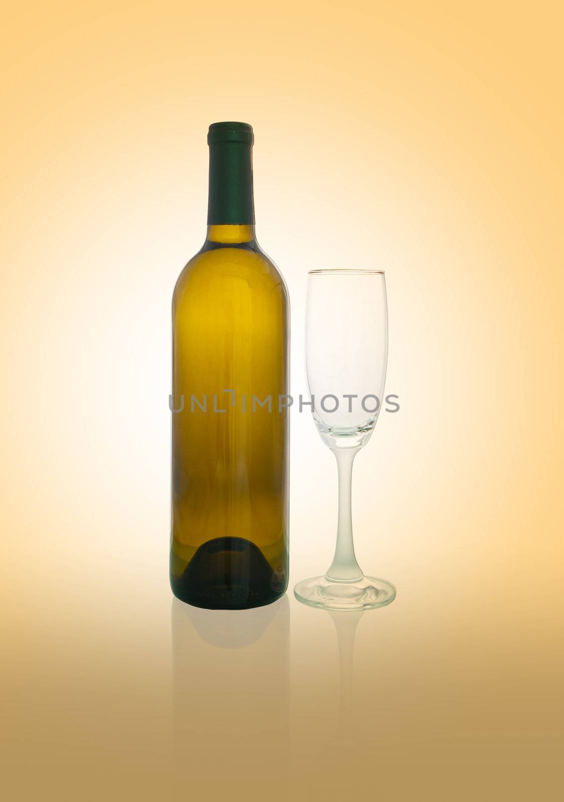 Empty bottles and glasses of wine on orange background