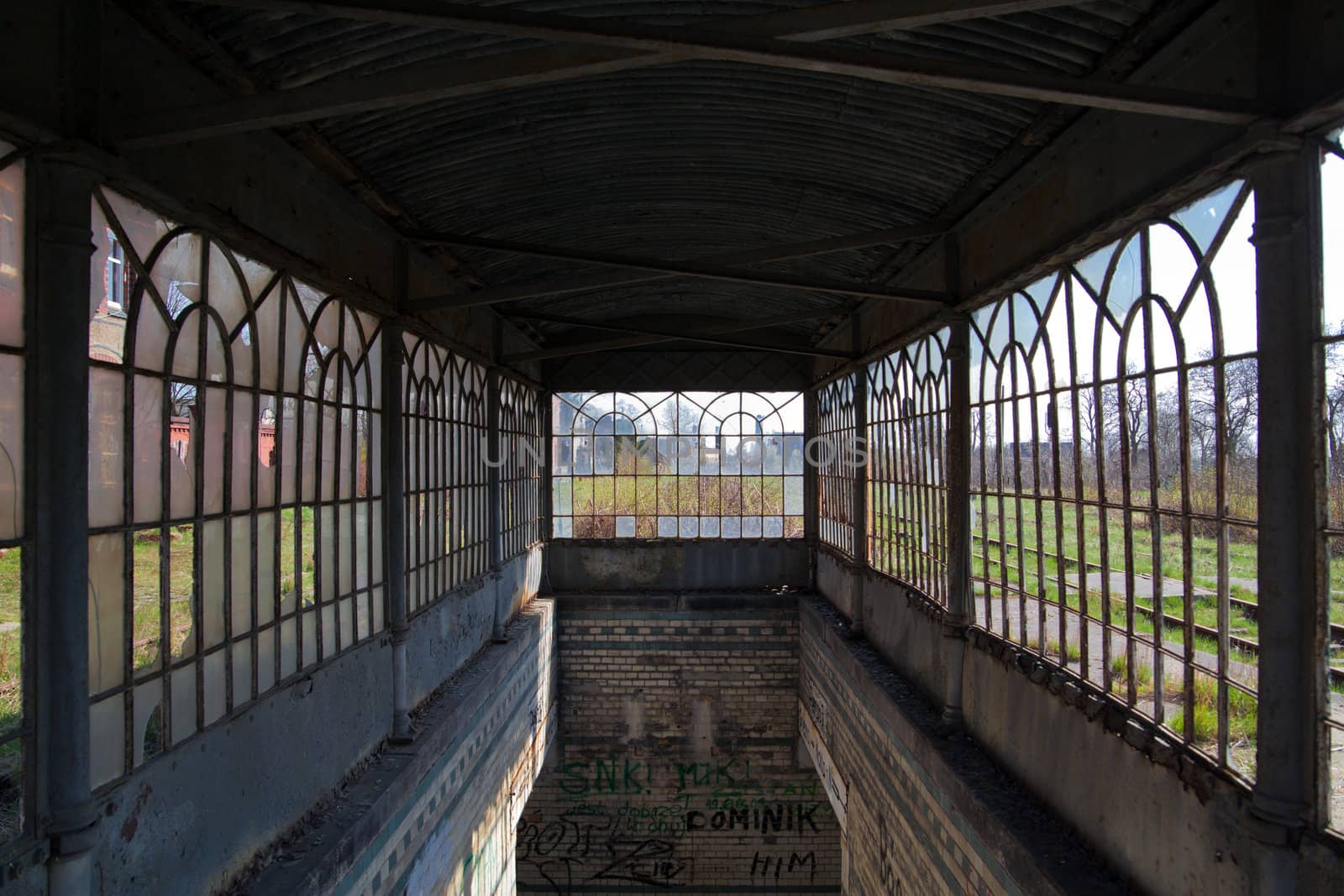 Broken windows of the old abandoned railway station
