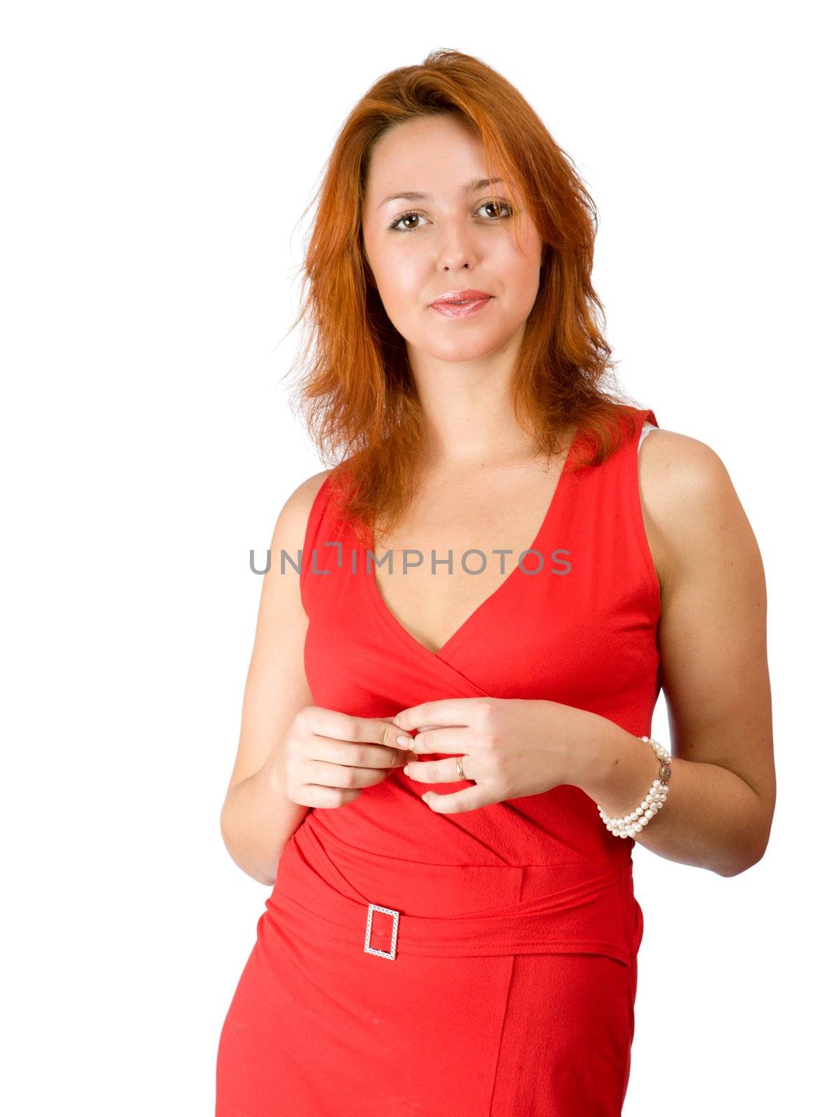 Portrait of Young redhead woman wearing red dress isolated