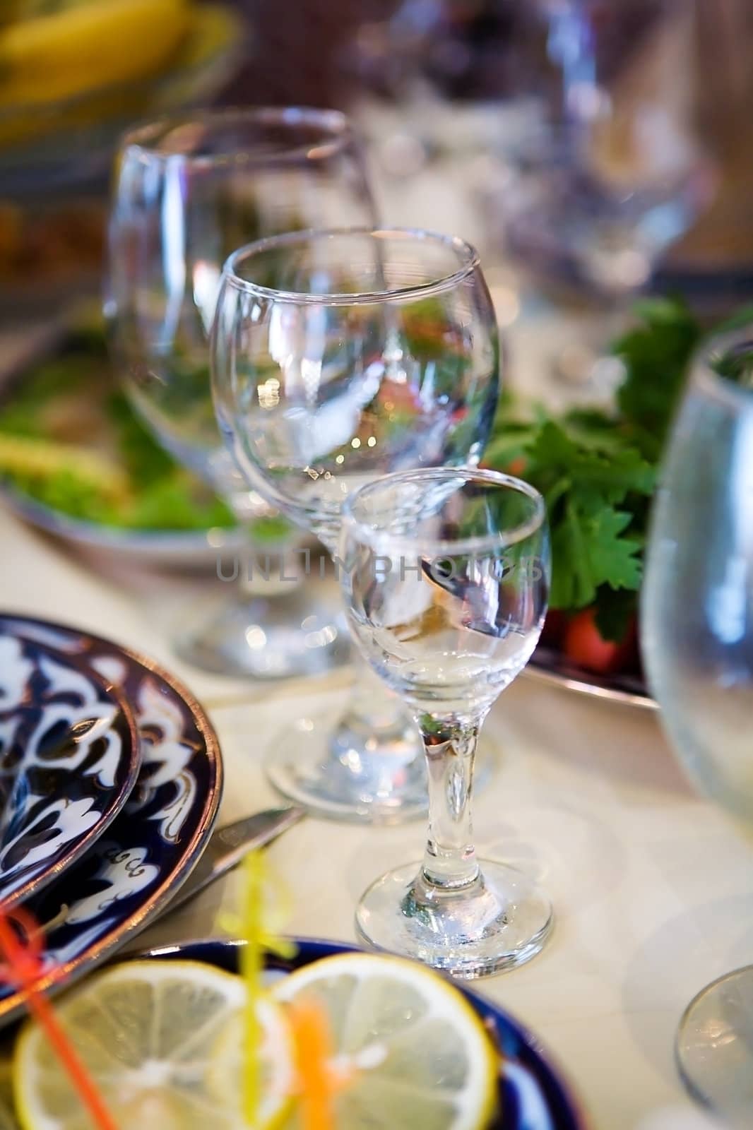 Empty Glasses on restaurant table before party begins