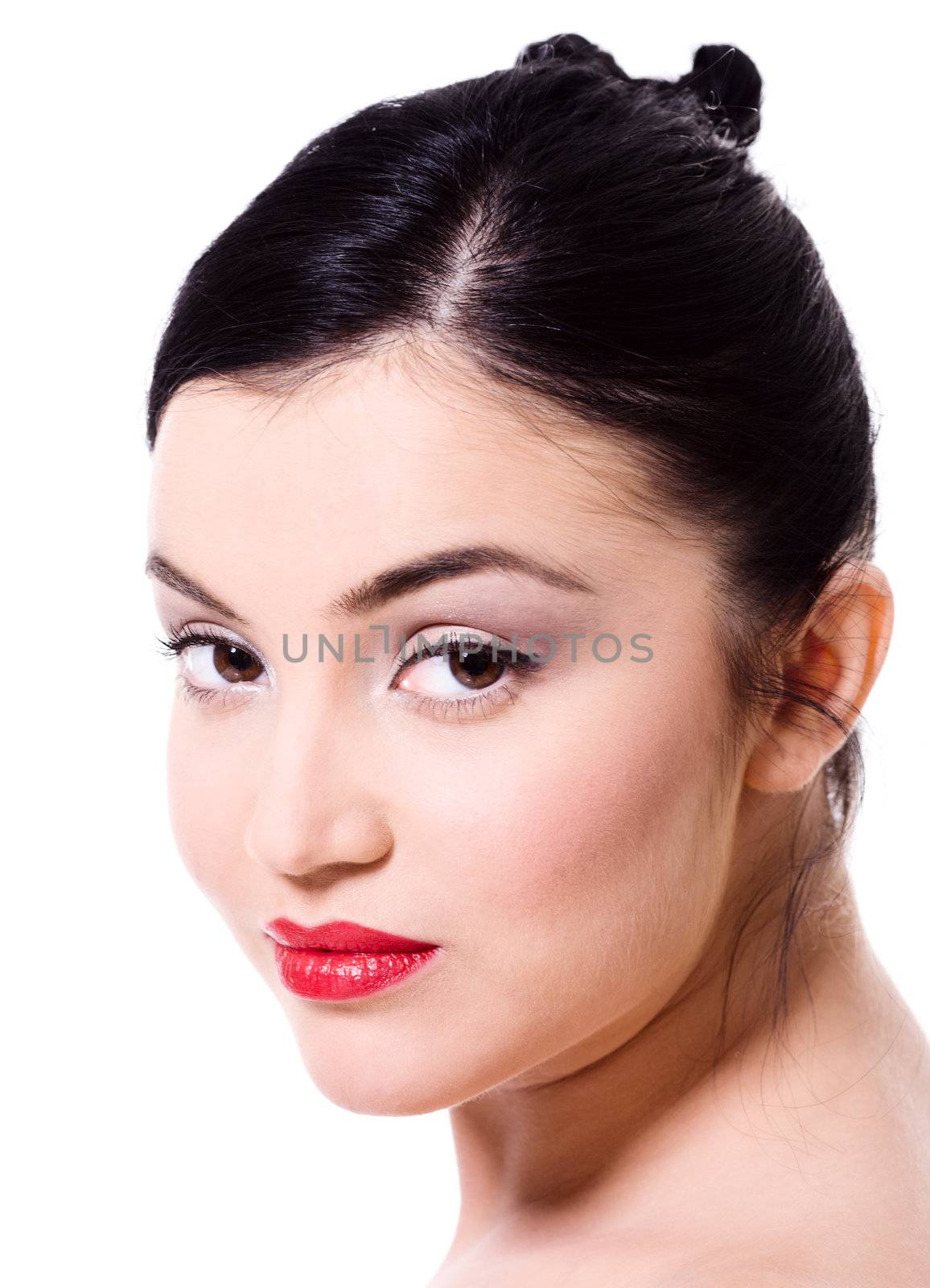 Closeup portrait of a beautiful young woman over white background