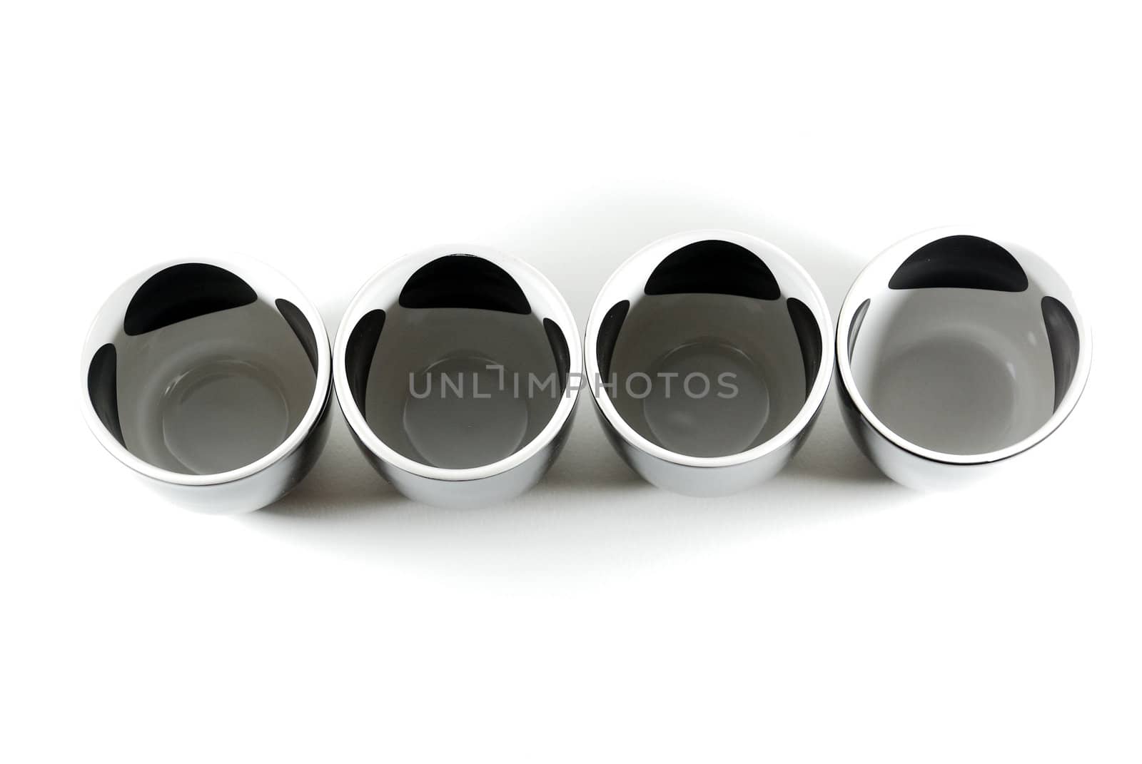 Cups arranged on a white background.