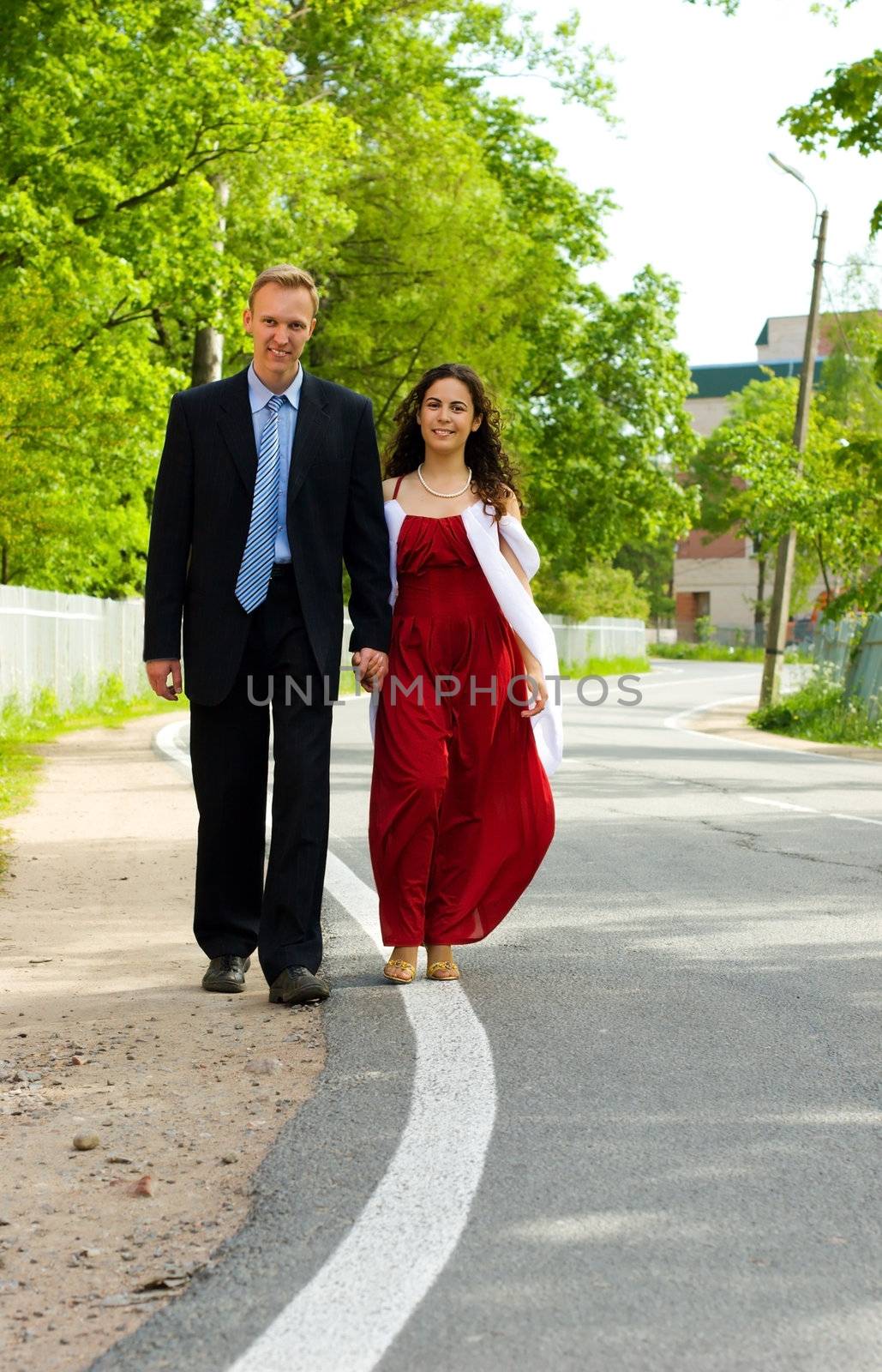 Happy young couple spending time together outdoors