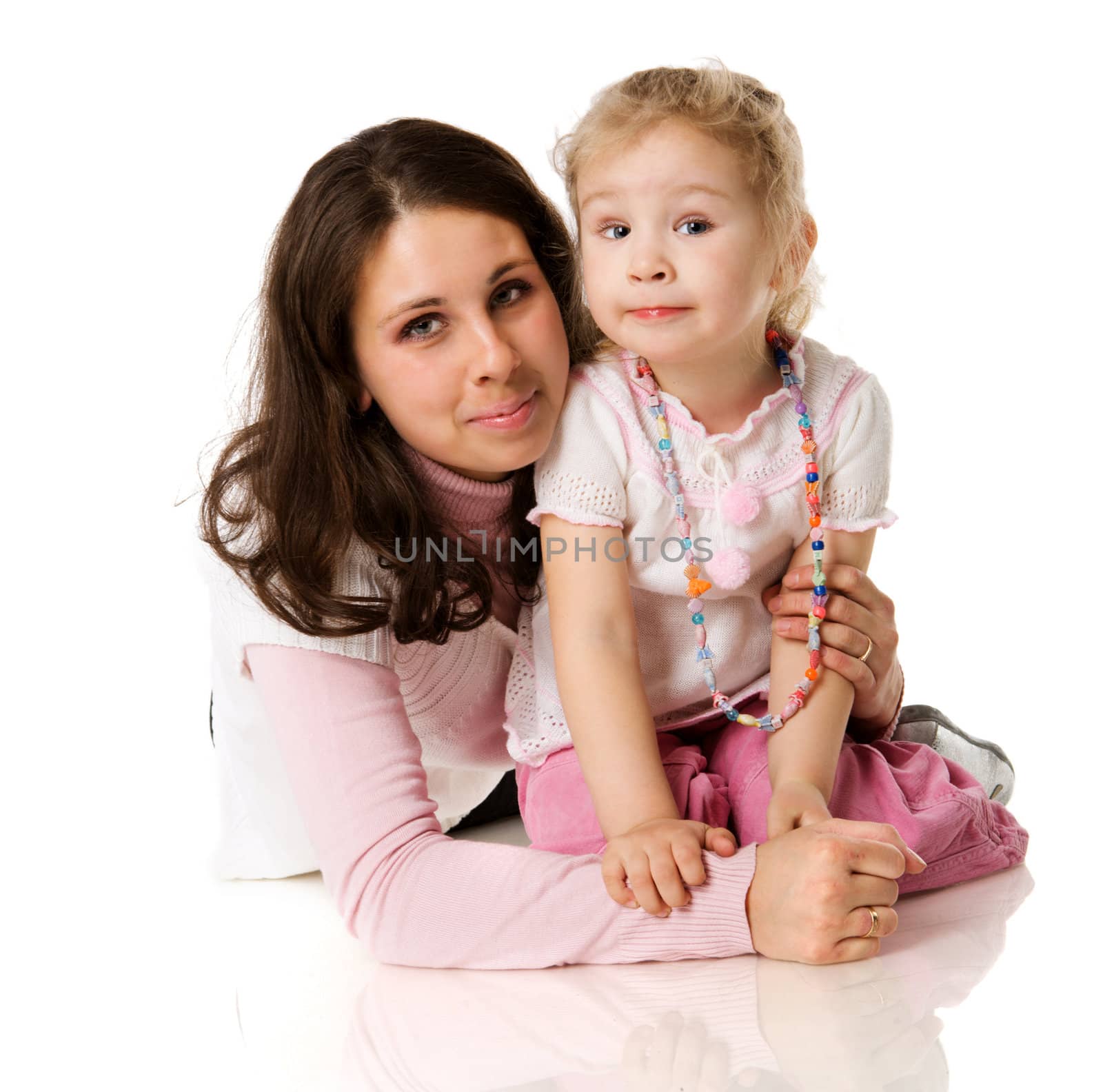 mother and daughter posing together  isolated on white