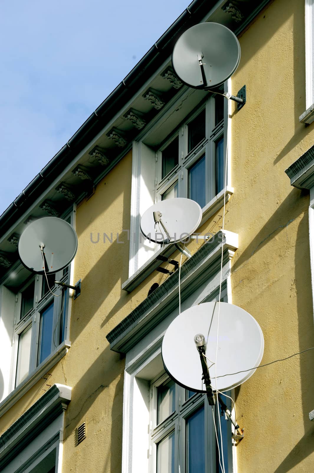 Satellite plates on a residential building facade