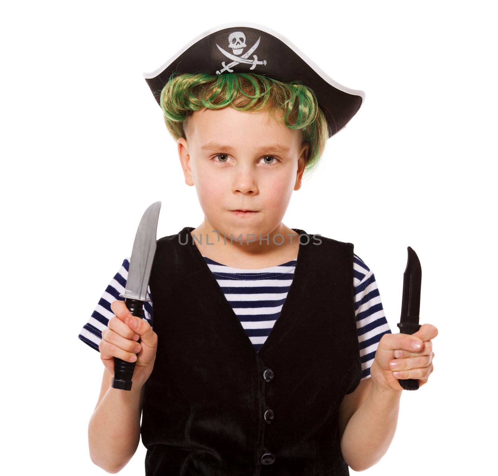 Boy wearing pirate costume holding knifes isolated on white