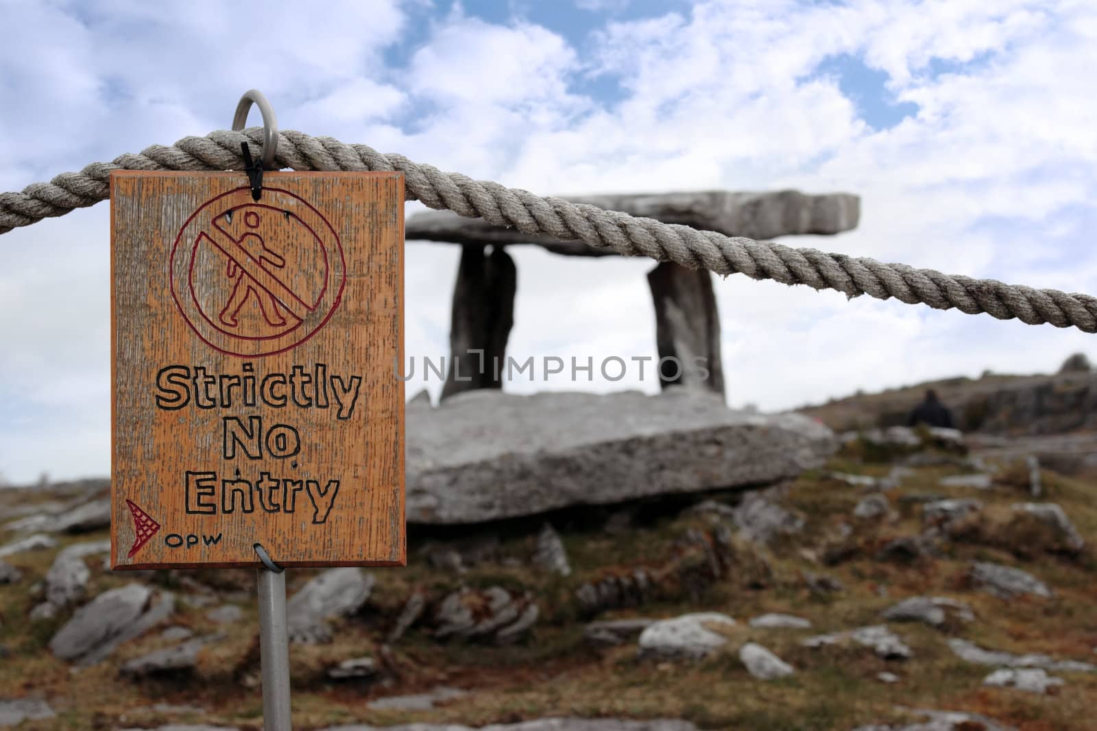 poulnabrone dolmen historic portal tomb in the burren in county clare with a no entry sign
