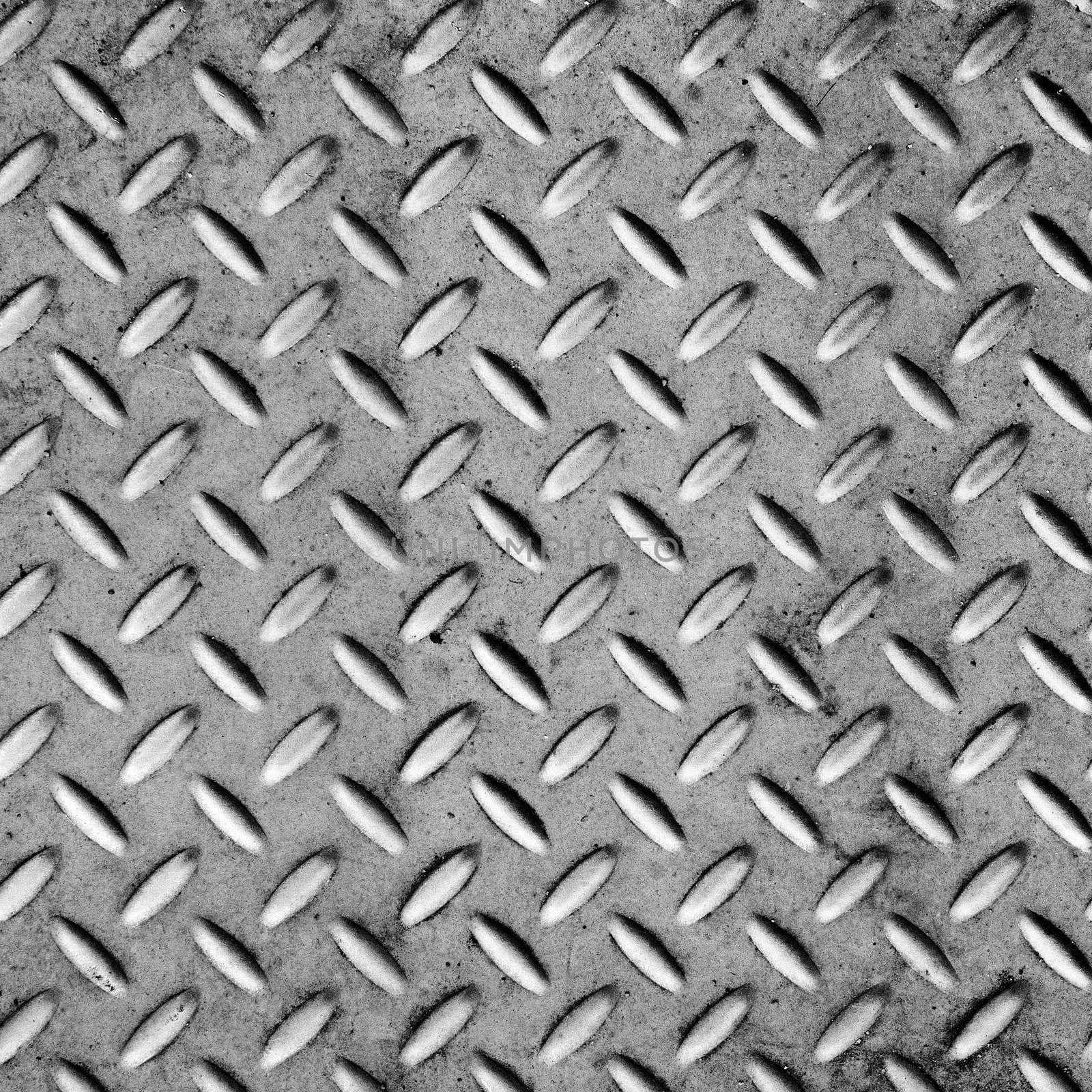 Background of metal diamond plate in silver color.