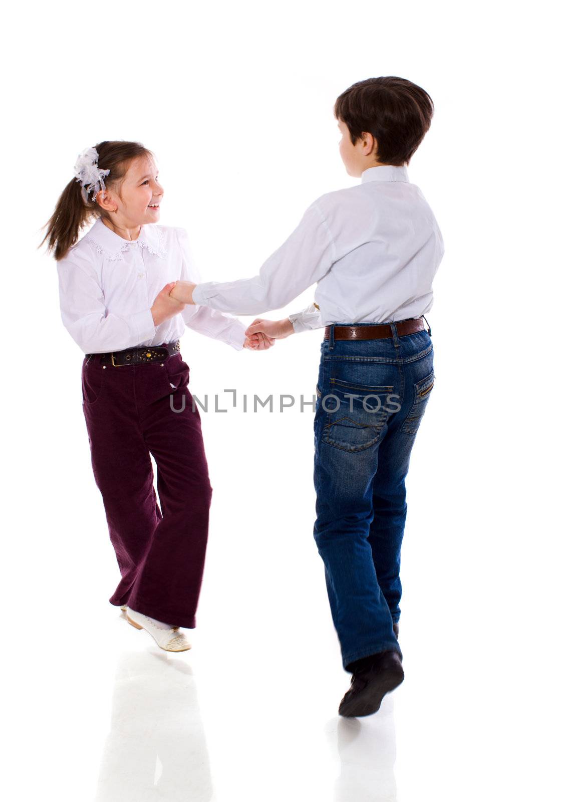 Two Dancing children isolated on white