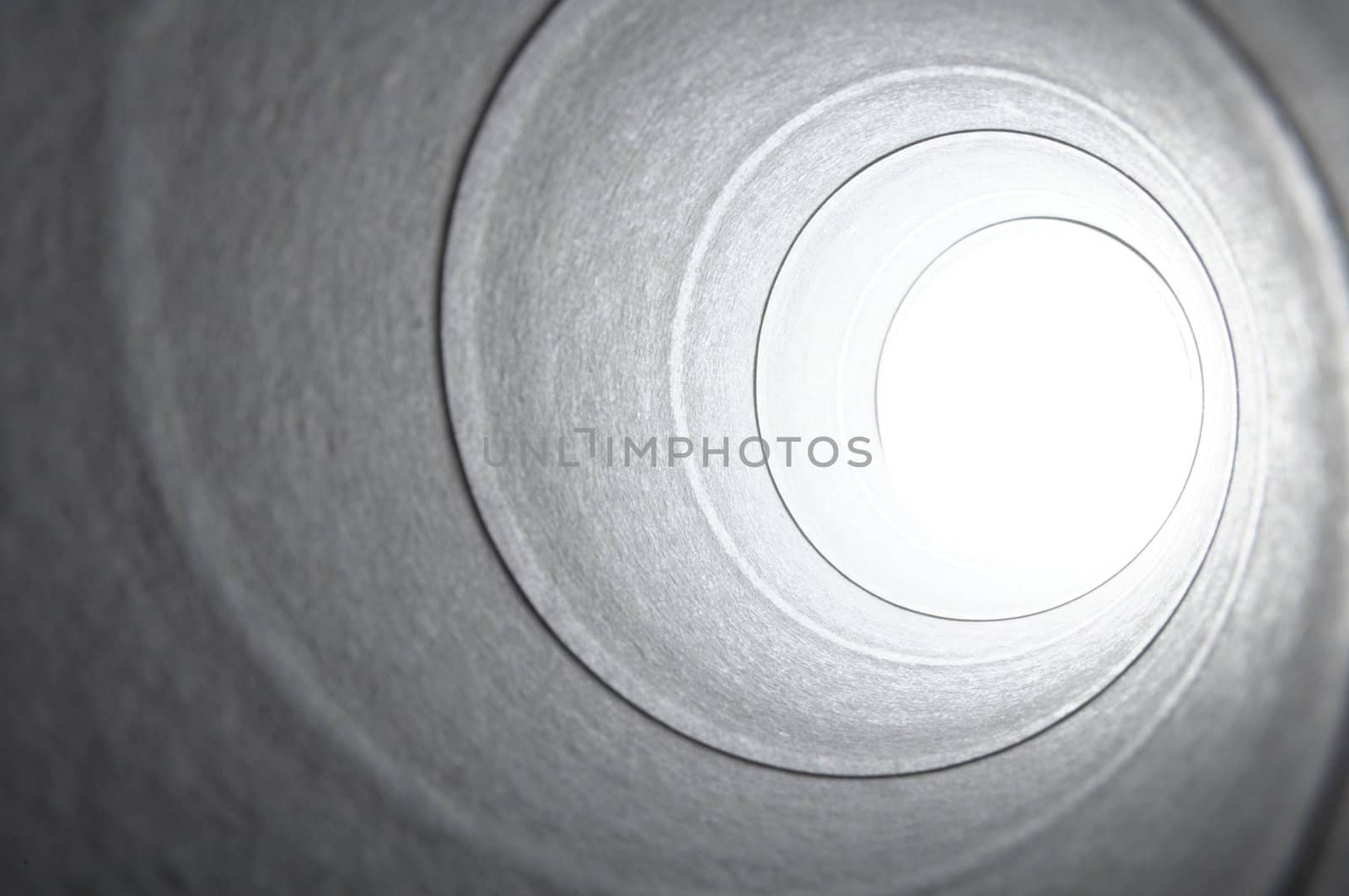 abstract dark and bright spiral background with white copyspace