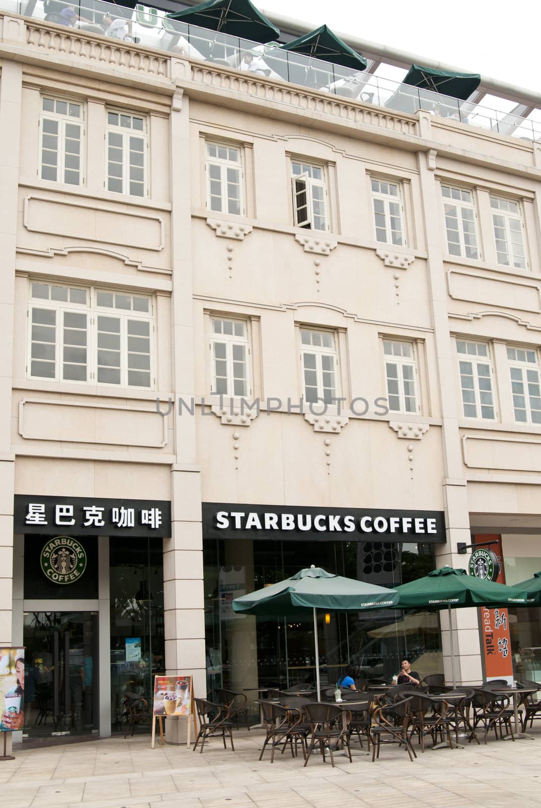 Xiamen, China - September 25:  A new Starbucks coffee shop near the popular tourist destination of Gulangyu opens in the city of Xiamen, China.  Currently it is the largest in all of China.