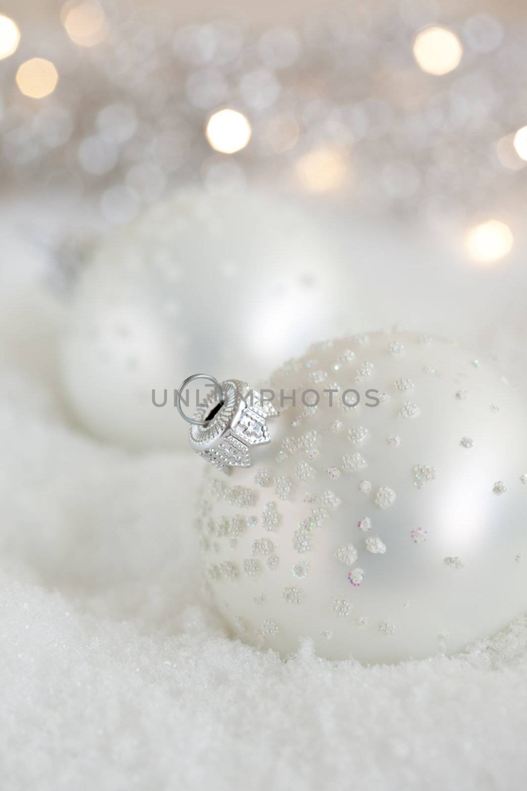 Christmas baubles in the snow by Fotosmurf