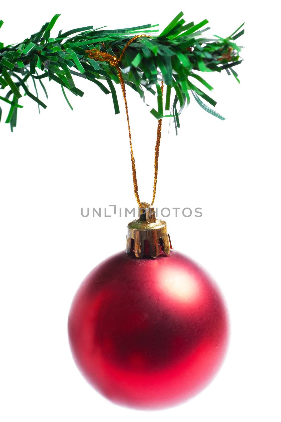 Decoration on a branch of manufactured christmas tree isolated on the white background