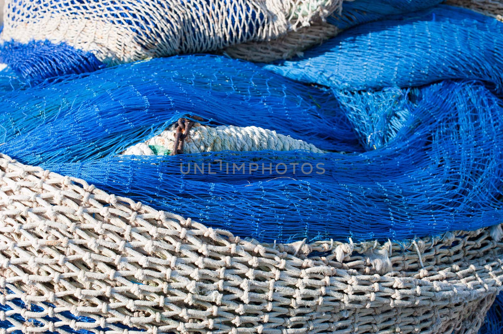 Closeup of a stack of traditional fishing nets