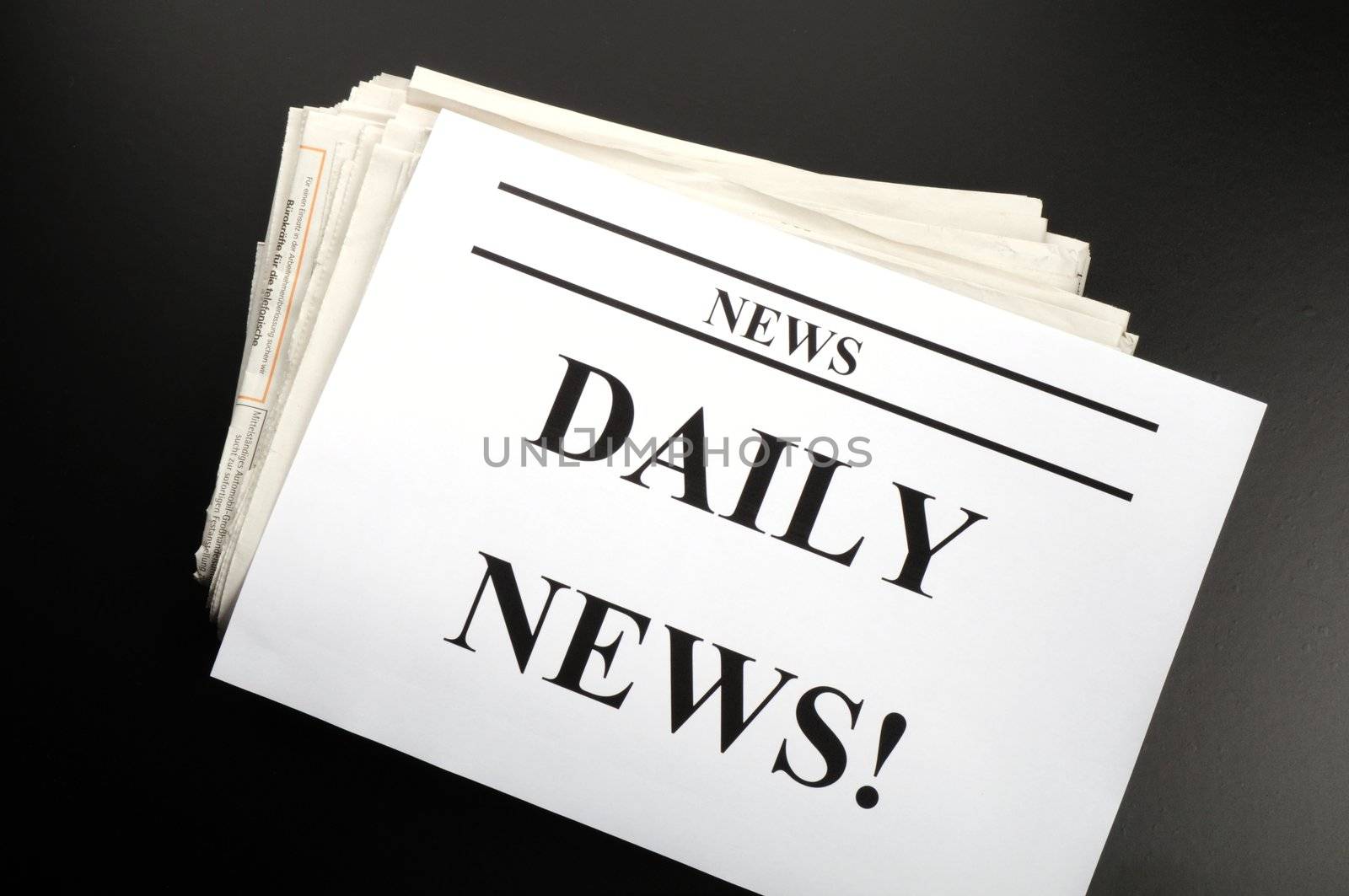 newspaper newsletter or news concept with pile of papers