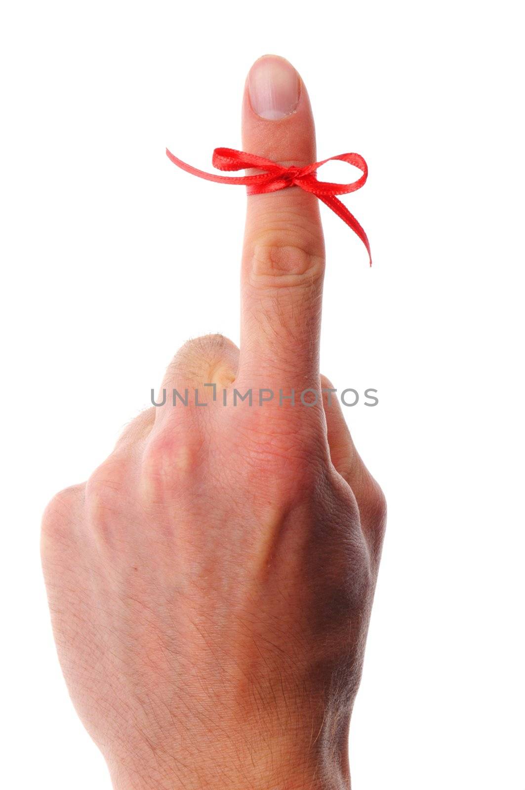 red bow on male finger showing reminder or dont forget concept in white